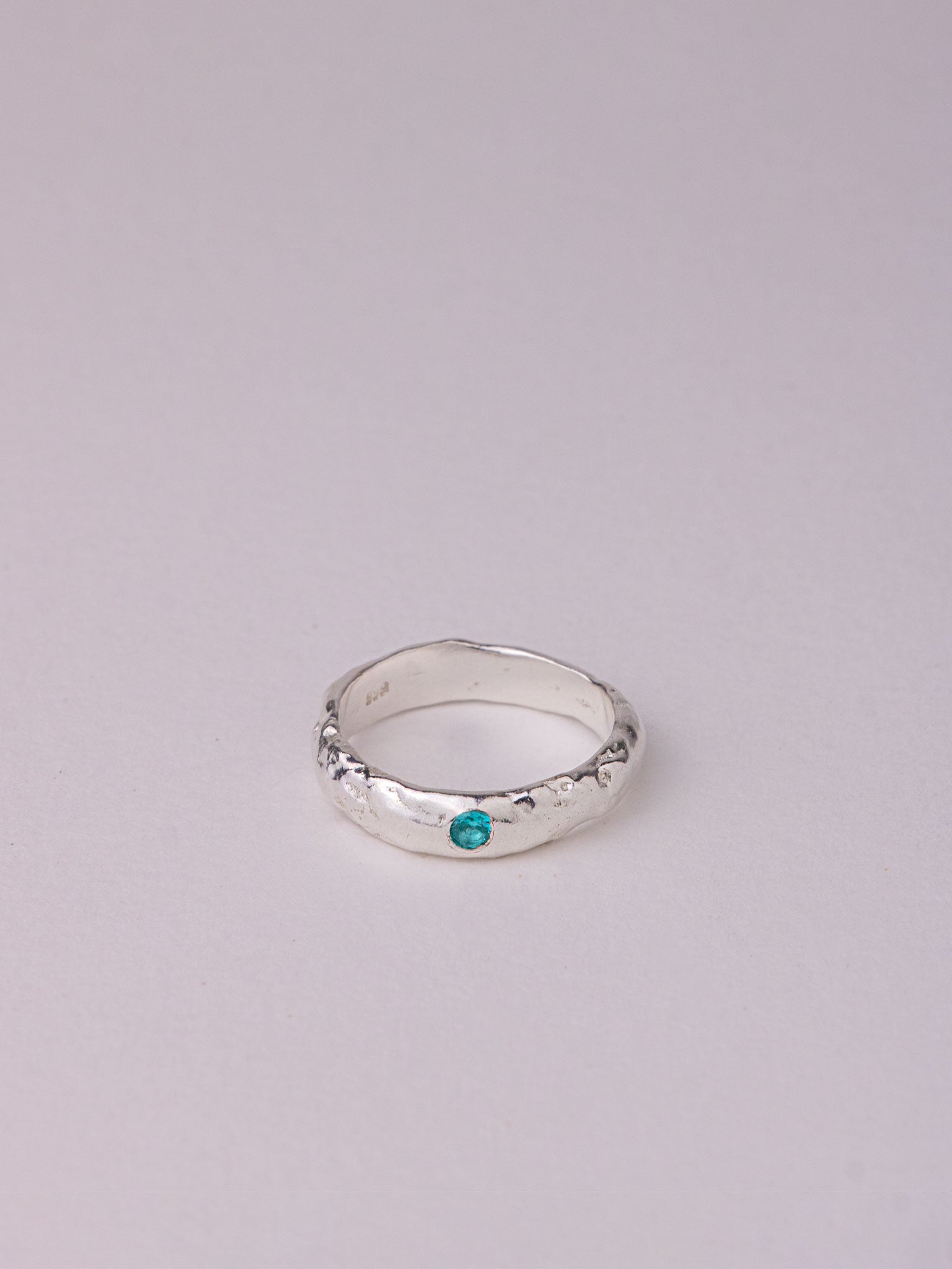 Χειροποίητo χυτό δαχτυλίδι από καθαρό ασήμι με γαλαζοπράσινο Cubic Zirconia