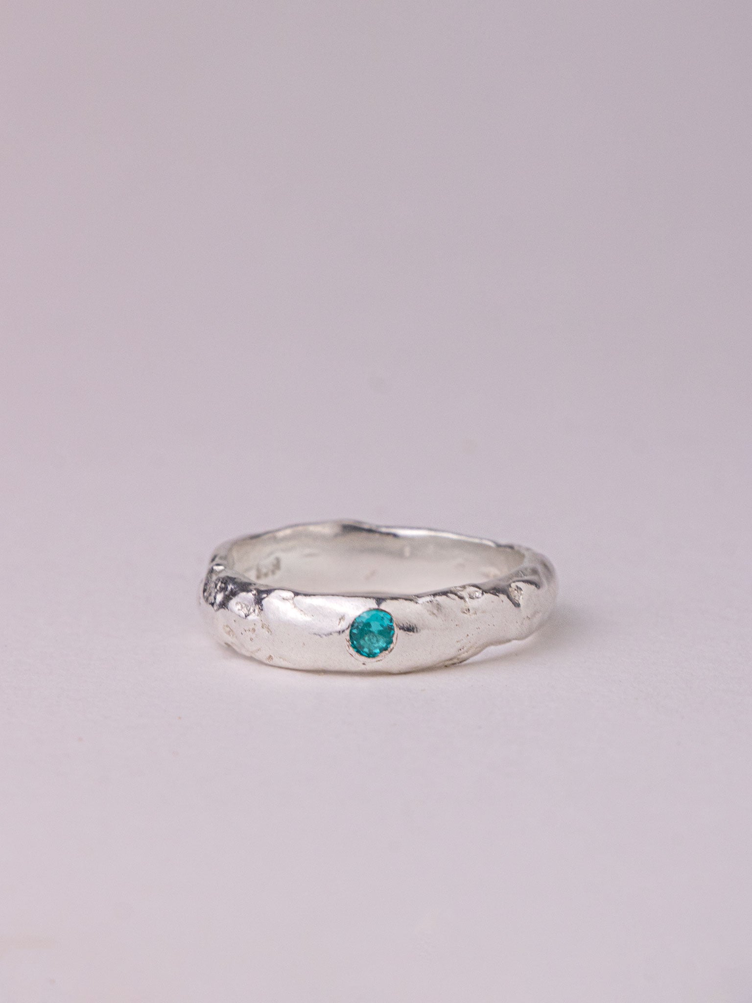 Χειροποίητo χυτό δαχτυλίδι από καθαρό ασήμι με γαλαζοπράσινο Cubic Zirconia